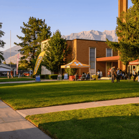 Outdoor community service event in Utah with volunteers and local partners, promoting neighborhood revitalization and civic engagement